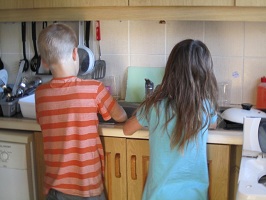 children washing dishes