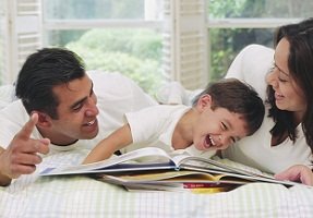 Happy family reading together